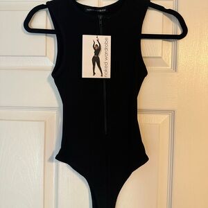 Naked wardrobe size medium zip up bodysuit